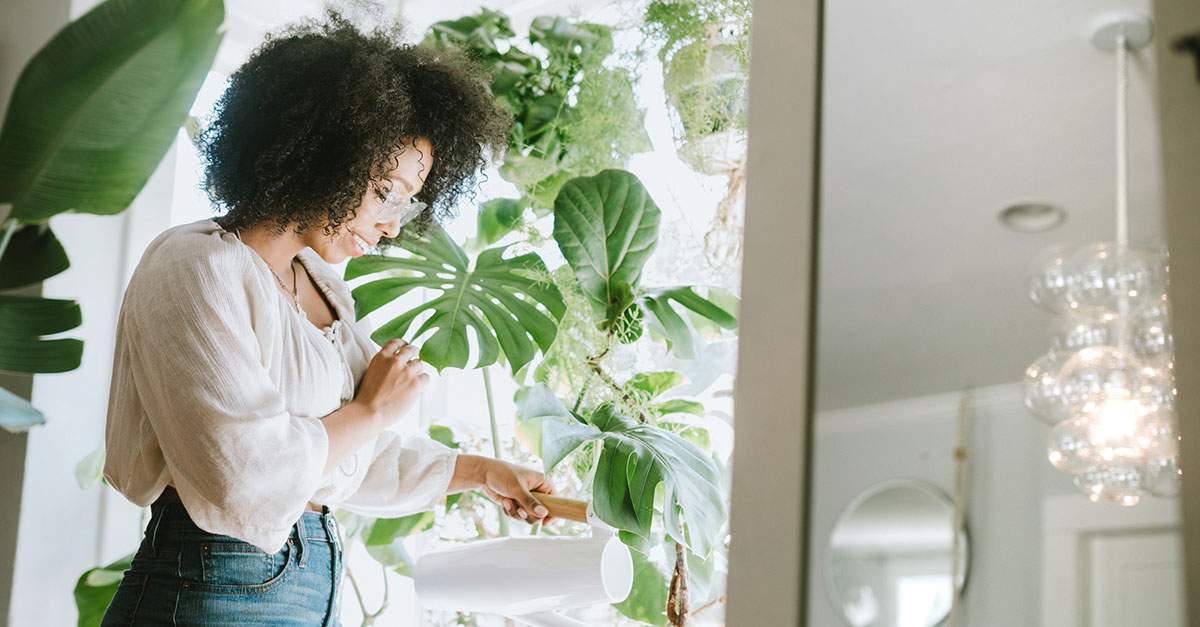 A woman taking care of her plants